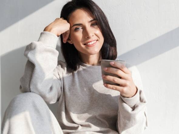 woman with ovulation issue drinking coffee