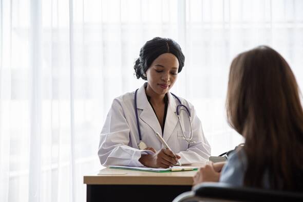 Doctor and patient discussing IVF cost in Philadelphia